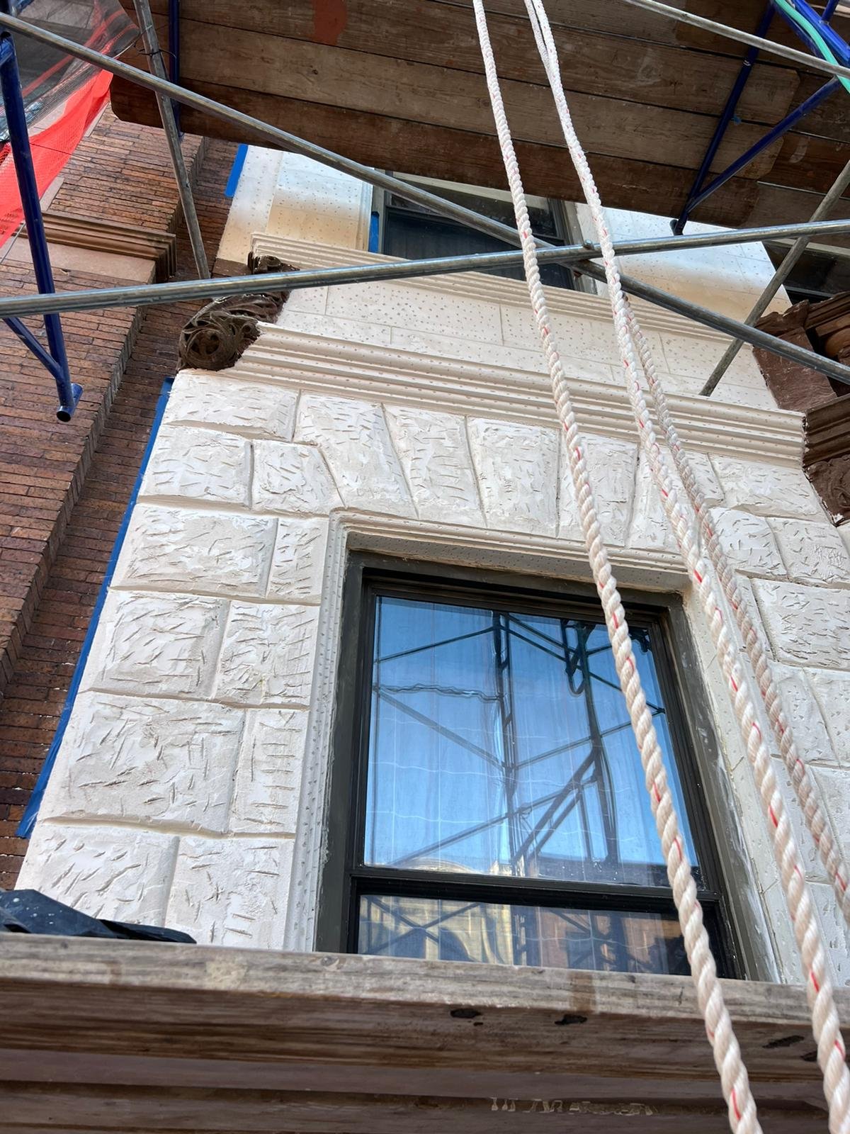 PHOTO-2022-11-03-09-48-46 Painting limestone facade in NYC